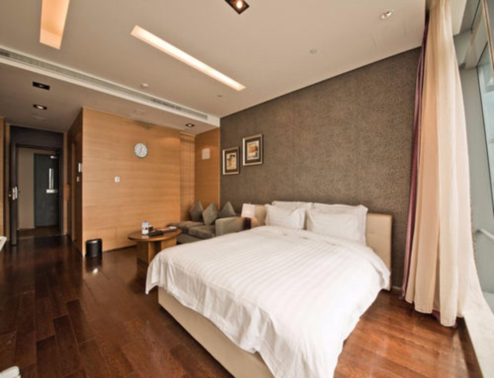 Grand Madison Qingdao Harbour-View Central（Former Qingdao Farglory Hotel） Exterior photo